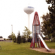 Image for article titled The haunting beauty of abandoned playground rockets